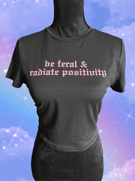 be feral & radiate positivity croptop
